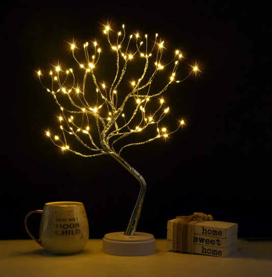 Decorative LED tree with lights on a dark background